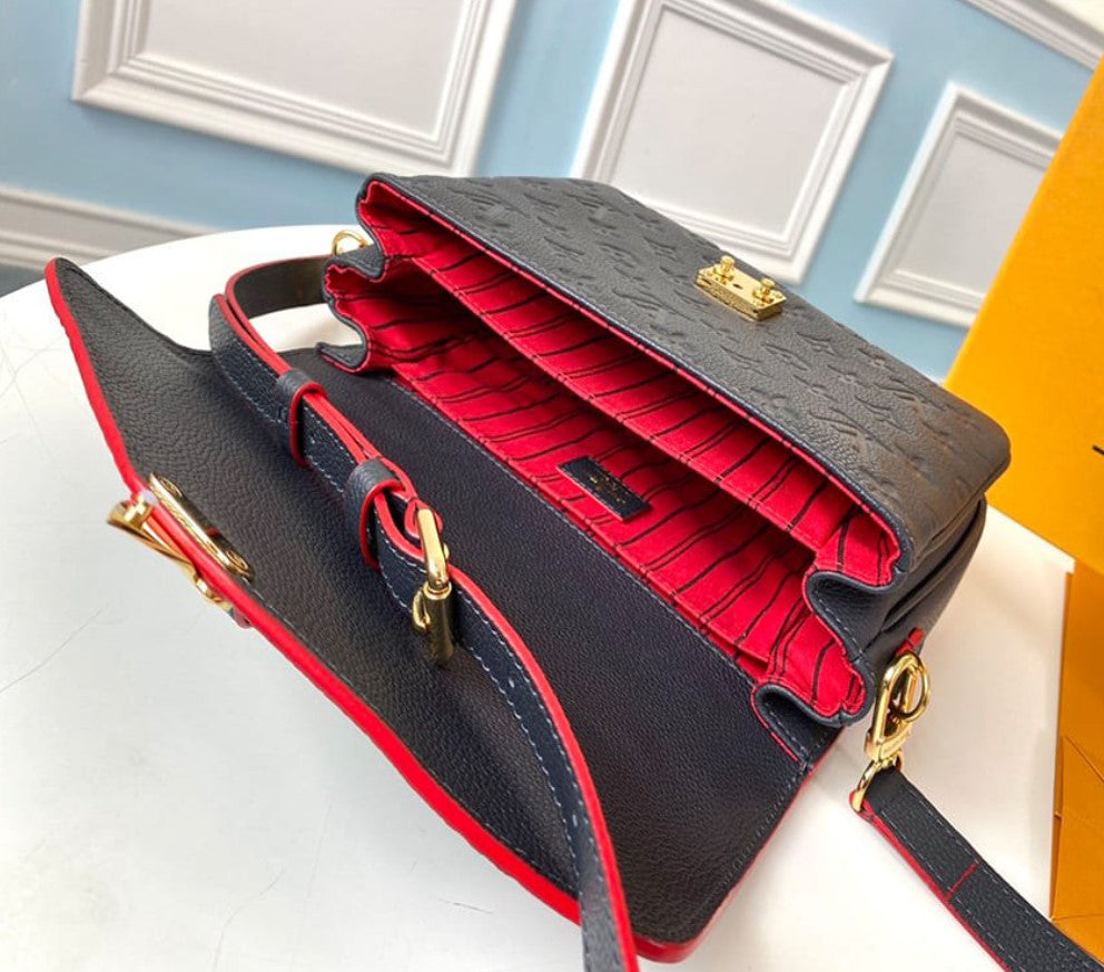 Louis Vuitton Pochette Metis Monogram Empreinte Bag M44071